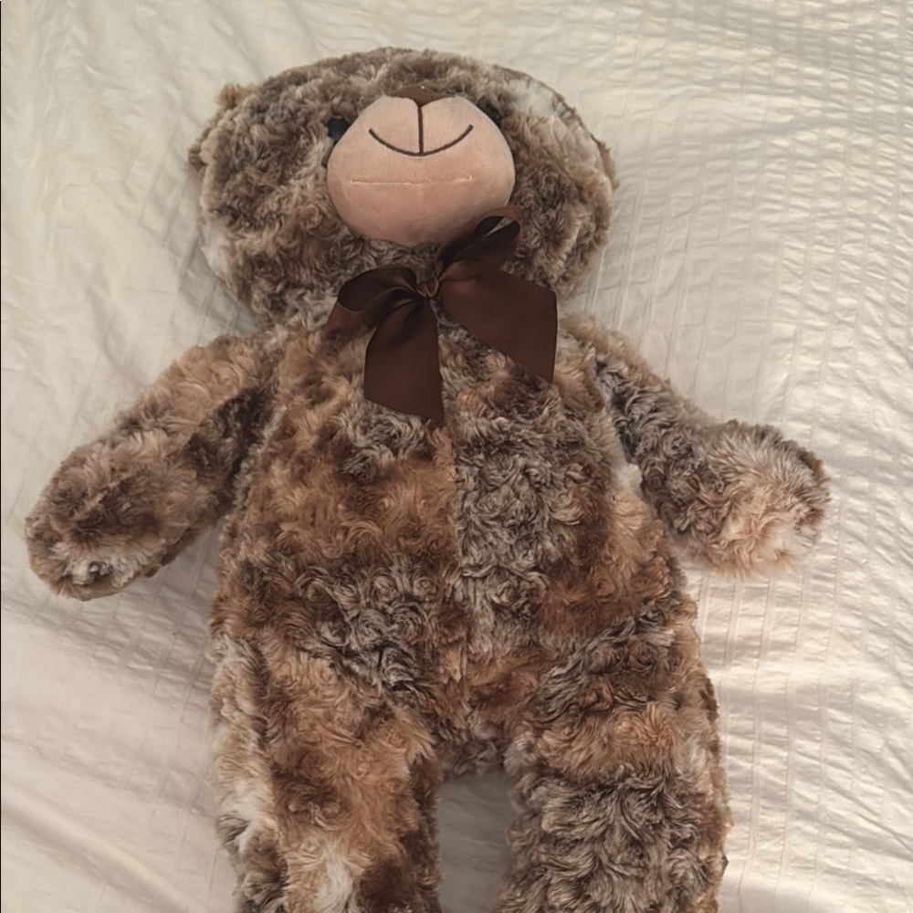 Plush Teddy Bear with Brown Bow